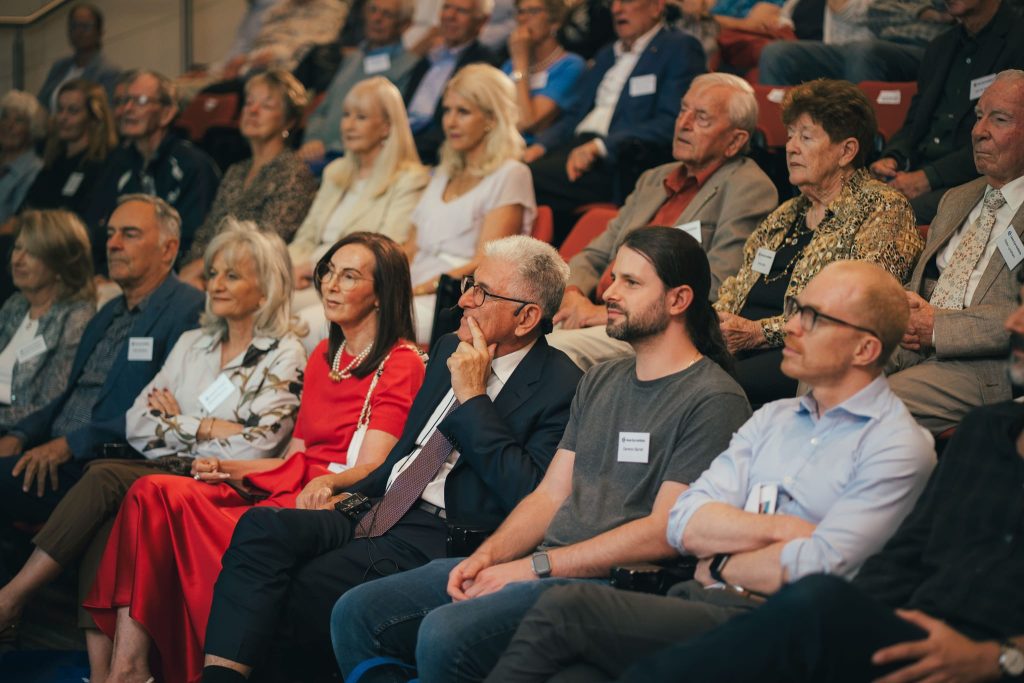Professor Graham Barrett in the audience before delivering his presentation