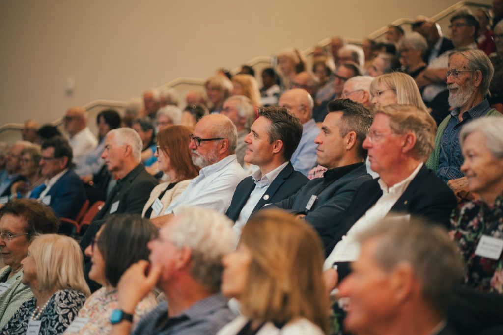 Previous Ian Constable Lecture presenter Professor Danail Obreschkow [middle] in the audience