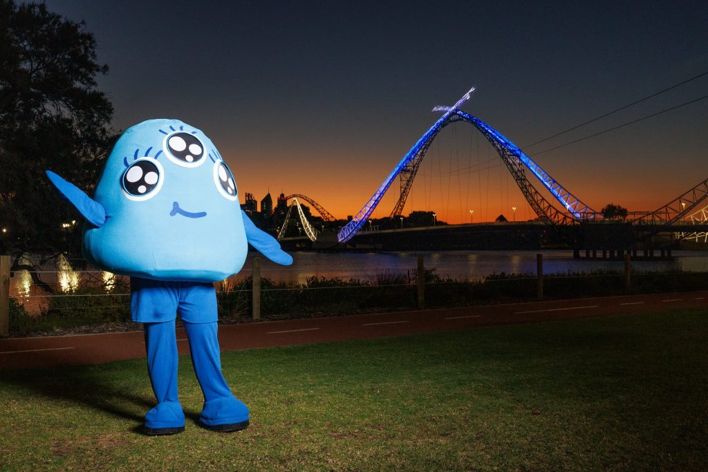 Iris, our mascot, in front of the Matagarup Bridge, which was lit up in our blue and white.